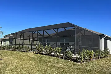 Bronze mansard screen enclosure by East Coast Aluminum